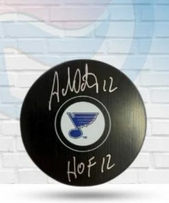 Fan Cave Sports Autographed Memorabilia Adam Oates St Louis Blues Autographed Logo Puck W/ "HOF 12" Inscription - COA