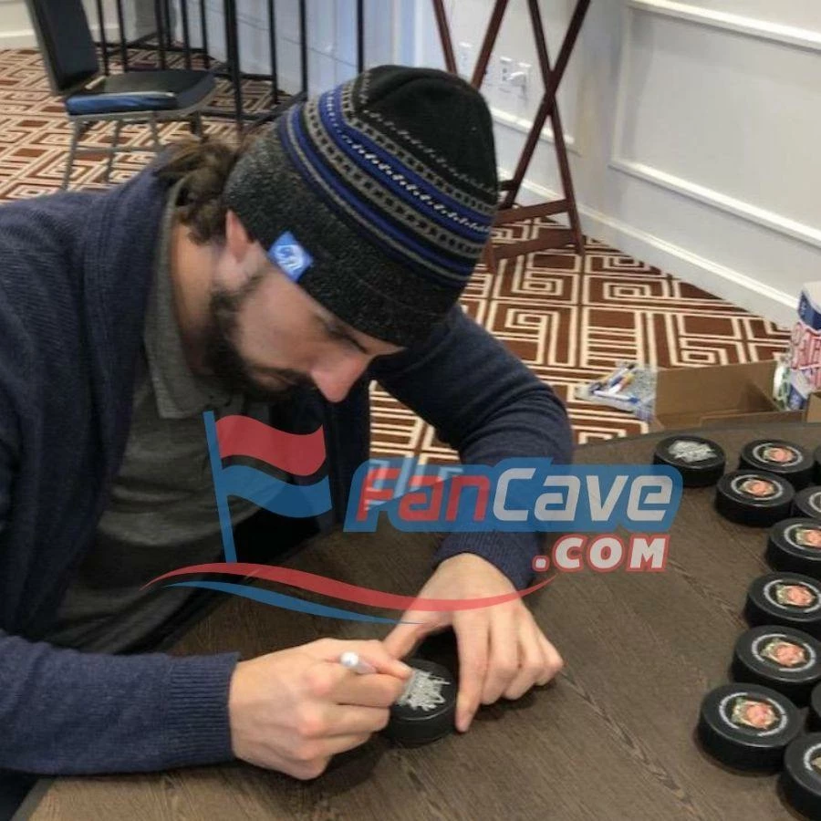 Fan Cave Sports Connor Hellebuyck Winnipeg Jets Autographed 2019 Heritage Classic Puck - COA