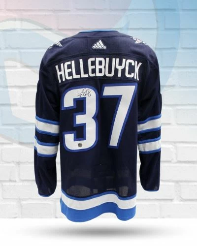 Fan Cave Sports Connor Hellebuyck Winnipeg Jets Autographed Home Adidas Jersey - COA 1 Fan Cave Sports Connor Hellebuyck Winnipeg Jets Autographed Home Adidas Jersey - COA